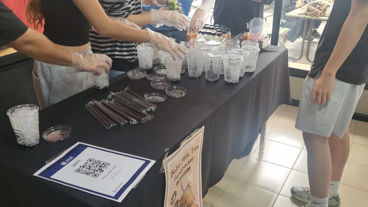 Gloves on and cups ready!—
Catalyst STUCO members prepare boba drinks during their lunch fundraiser.